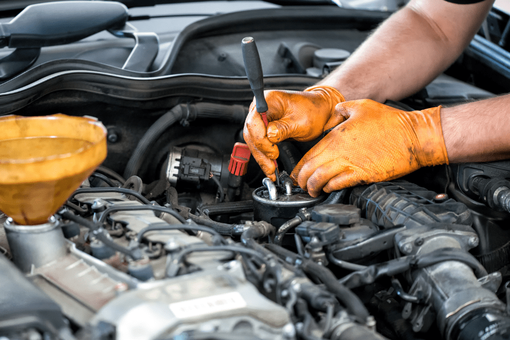 diesel engine maintenance, auto repair in Racine, WI at Durand Automotive. Image of a technician performing diesel engine maintenance.