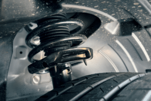 Pothole Season, Suspension Repair in Racine, WI At Durand Automotive. Close-up view of a vehicle’s suspension system